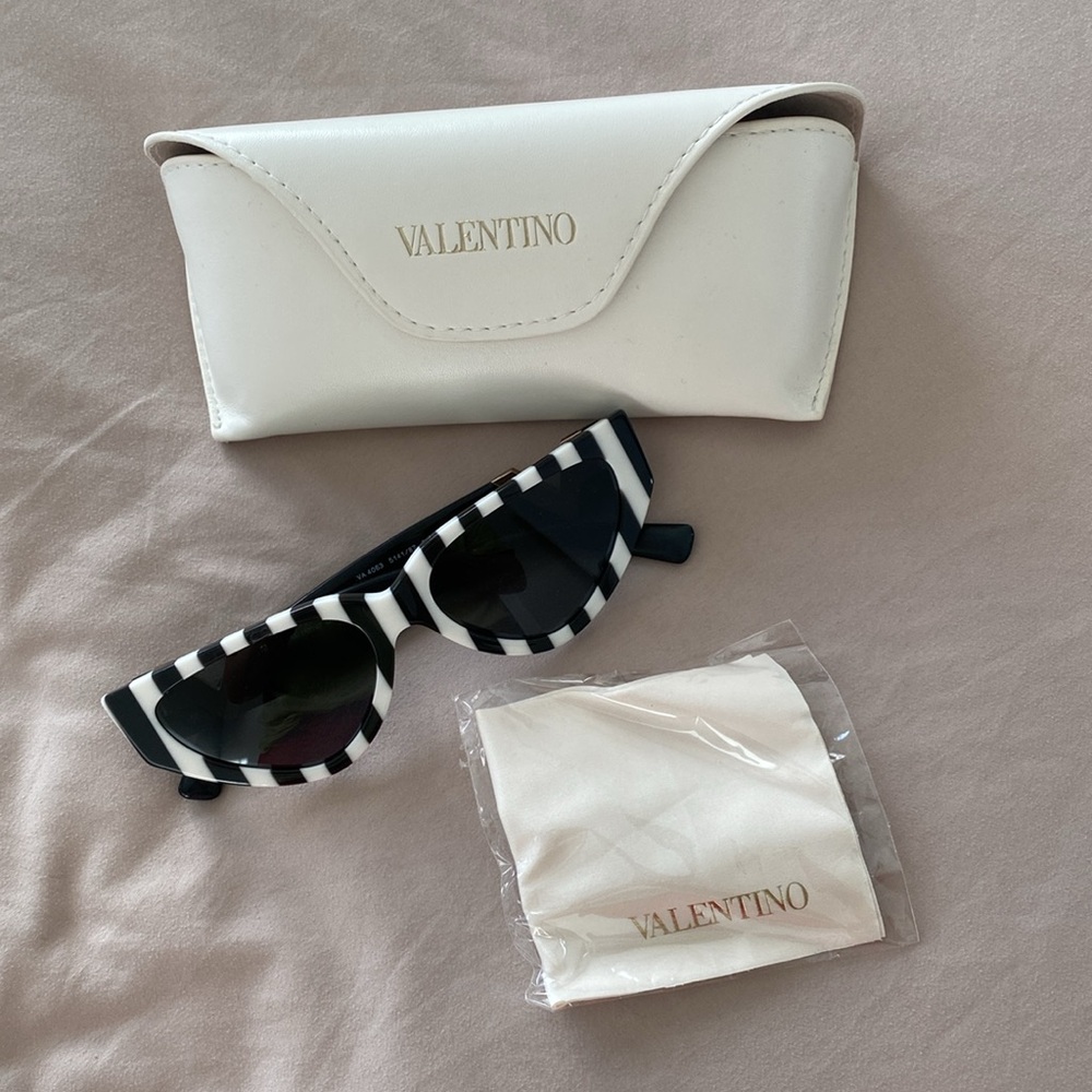 Brand new unique Valentino sunglasses!! Wrapped in packaging, no tag with it.
